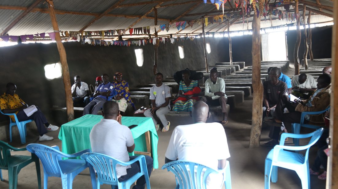 A community gathering in a church hall