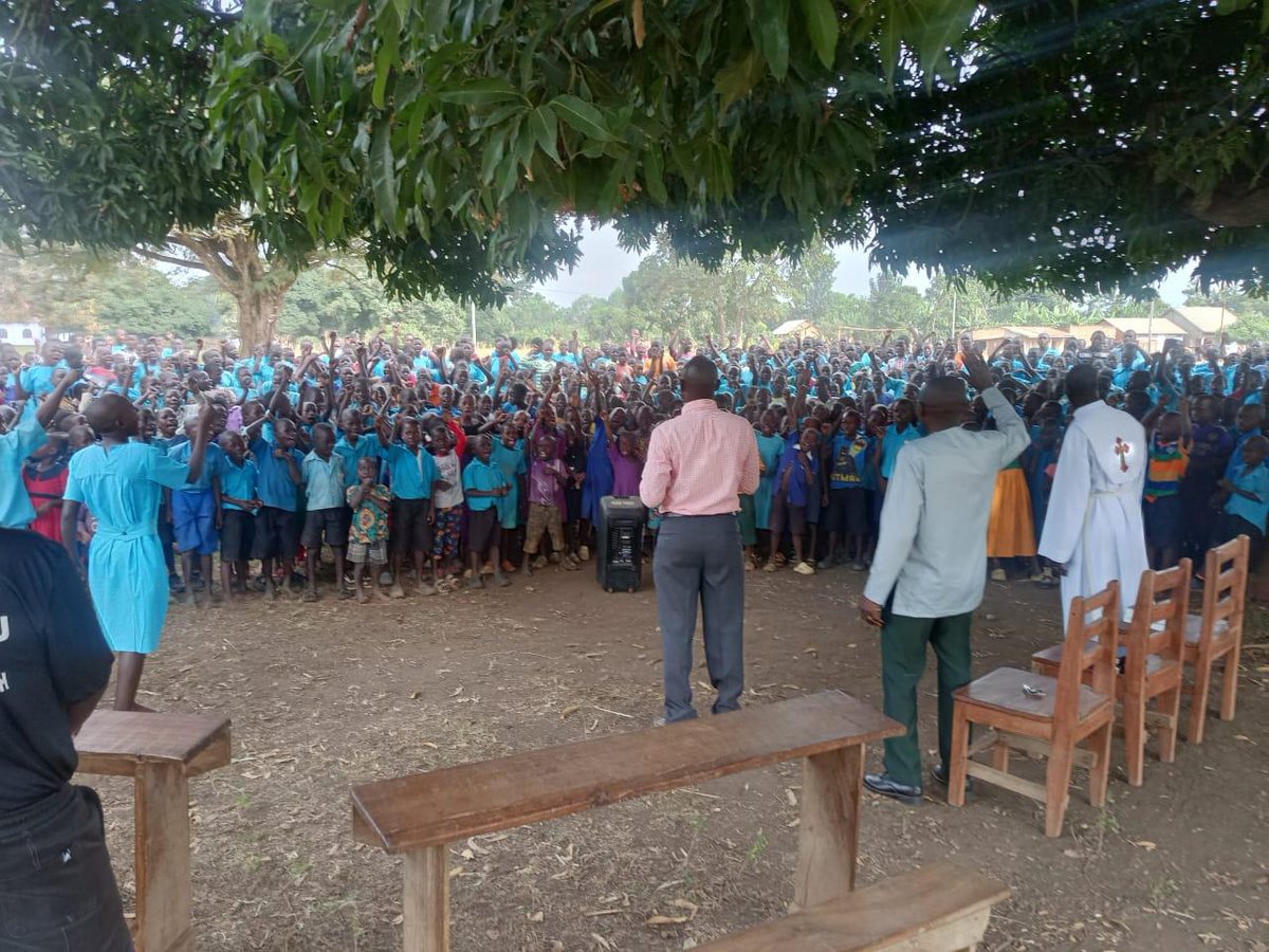 Young people gathered for a message on the school compound